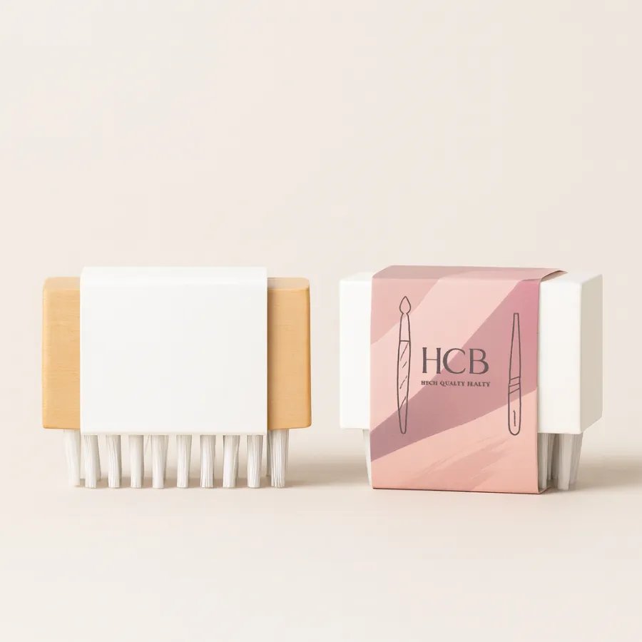 Wooden nail brushes shown with a plain white sleeve and a decorative pink branded wrap- class=
